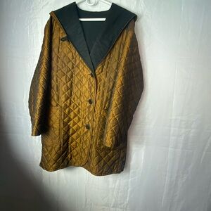 Elegant Quilted Tan Coat with Black Trim